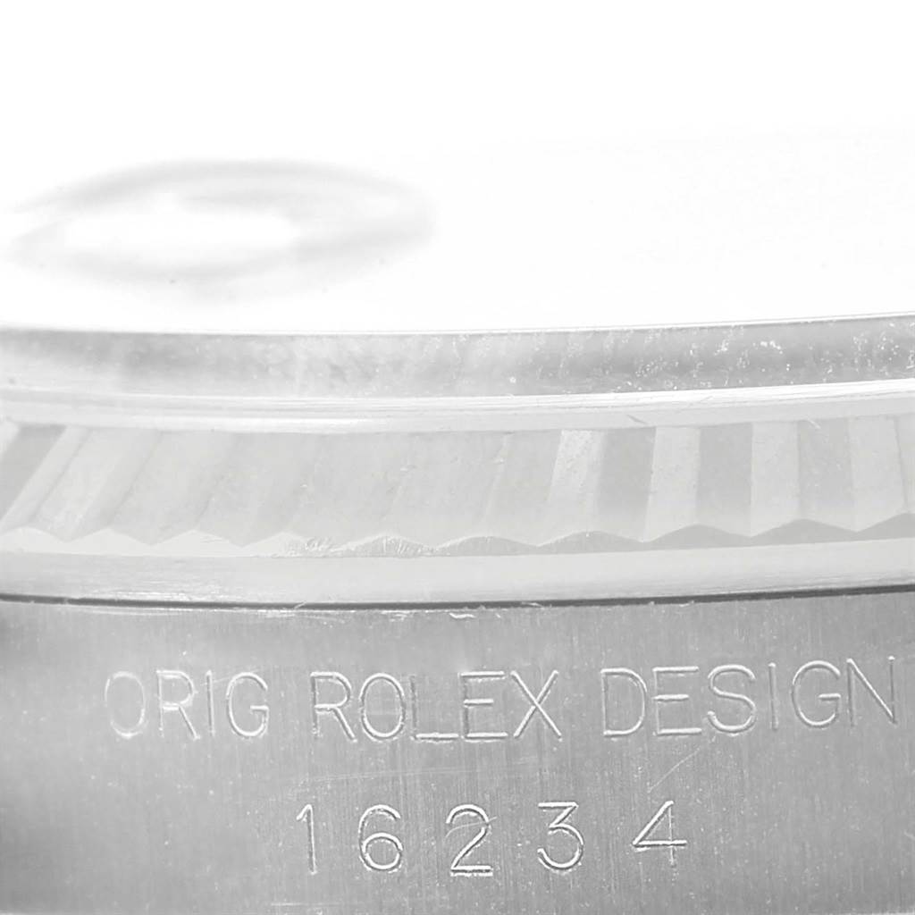 This image shows a close-up side view of the bezel and case side of the Rolex Datejust 16234 Men
s Stainless Steel Silver Dial 16234 Men
s Stainless Steel Silver Dial model, including its model number 16234.