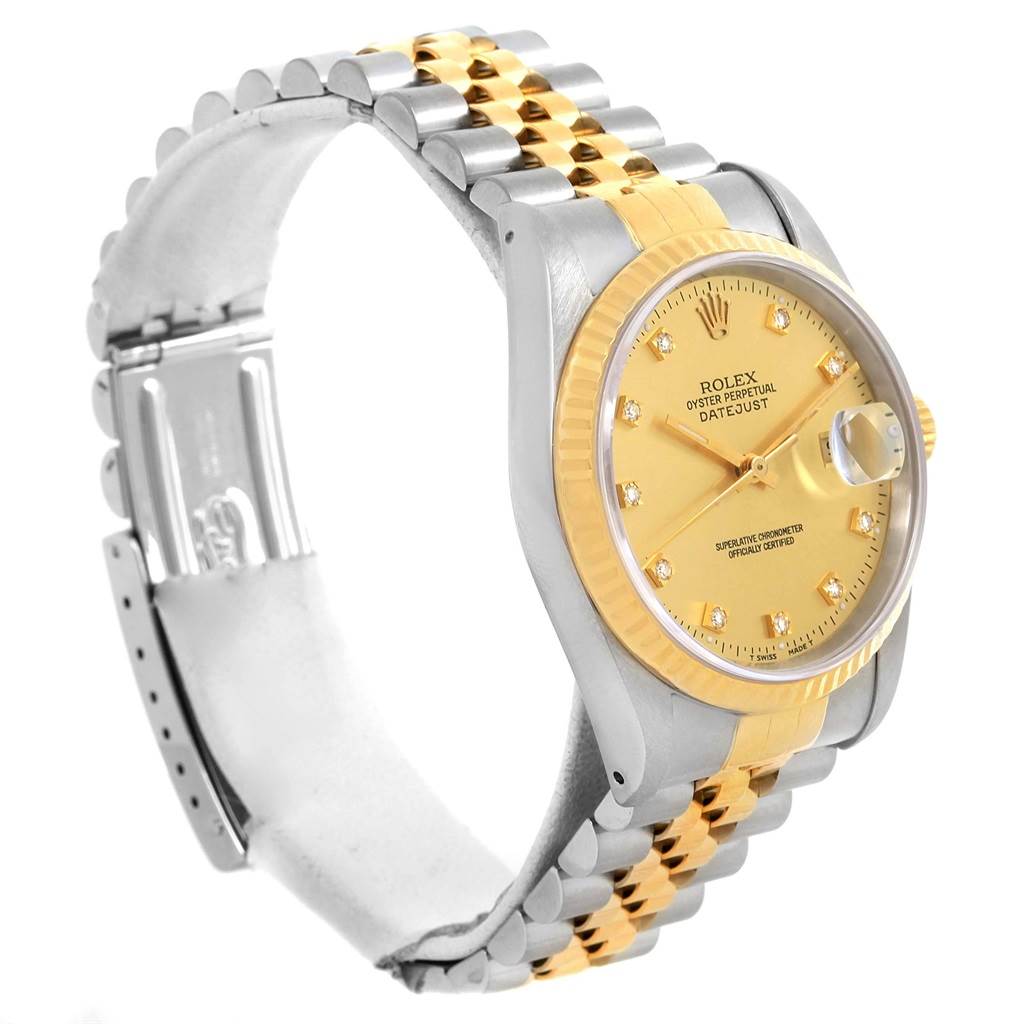 The Rolex Datejust 16233 Men's Steel and Gold (two tone) Champagne Dial 16233 Men's Steel and Gold (two tone) Champagne Dial is shown from a side angle, highlighting its two-tone bracelet, gold bezel, and champagne dial with diamond markers.