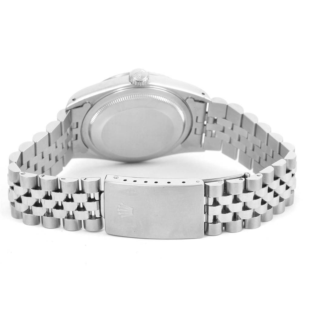 The image shows the back of the Rolex Datejust 16234 Men
s Stainless Steel Silver Dial 16234 Men
s Stainless Steel Silver Dial watch, focusing on the case back and deployed clasp with Jubilee bracelet.