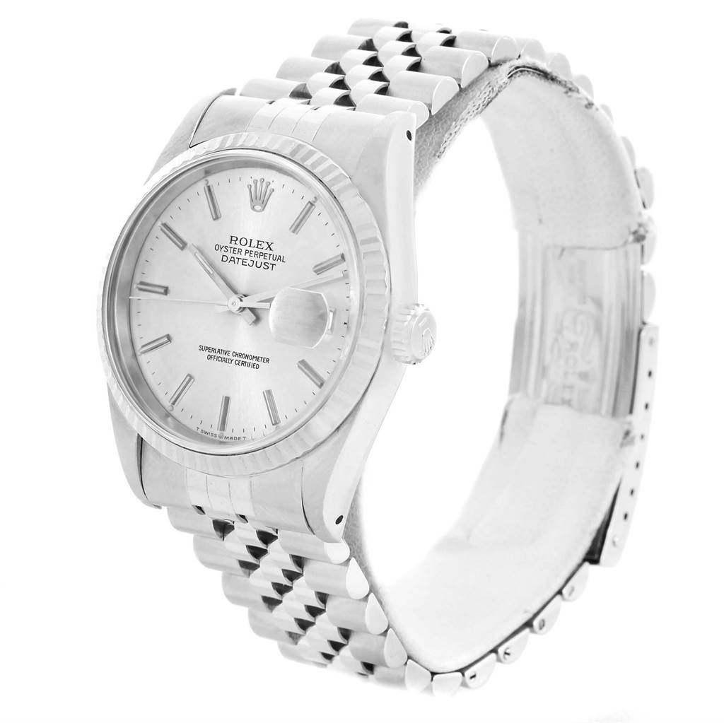 The image shows a side angle of the Rolex Datejust 16234 Men
s Stainless Steel Silver Dial 16234 Men
s Stainless Steel Silver Dial watch, highlighting its dial, case, and Jubilee bracelet.