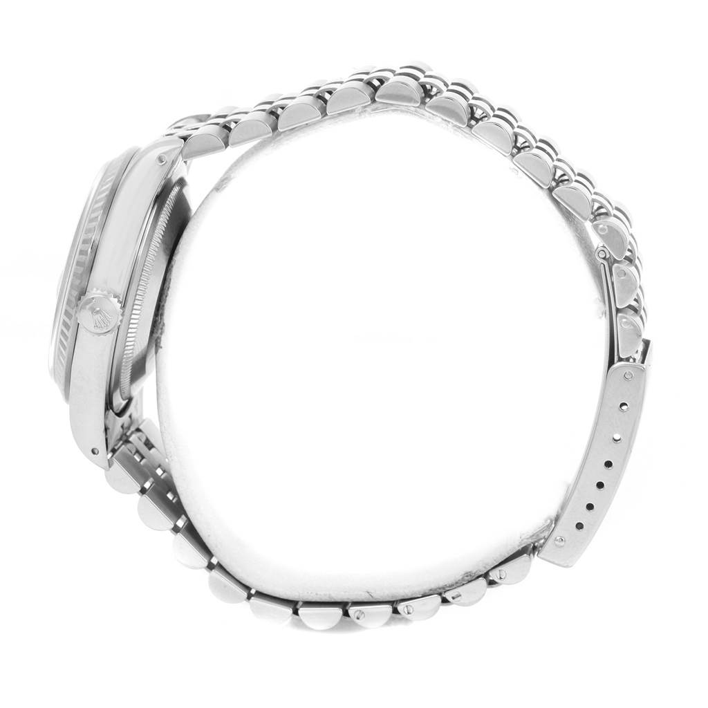 The image shows a side view of the Rolex Datejust 16234 Men
s Stainless Steel Silver Dial 16234 Men
s Stainless Steel Silver Dial watch, highlighting the case, crown, and bracelet.