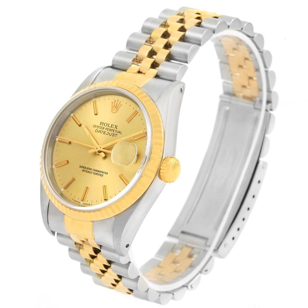 This Rolex Datejust 16233 Men's Steel and Gold (two tone) Champagne Dial 16233 Men's Steel and Gold (two tone) Champagne Dial watch is shown at a slight angle, highlighting its gold and silver bracelet, dial, and bezel.