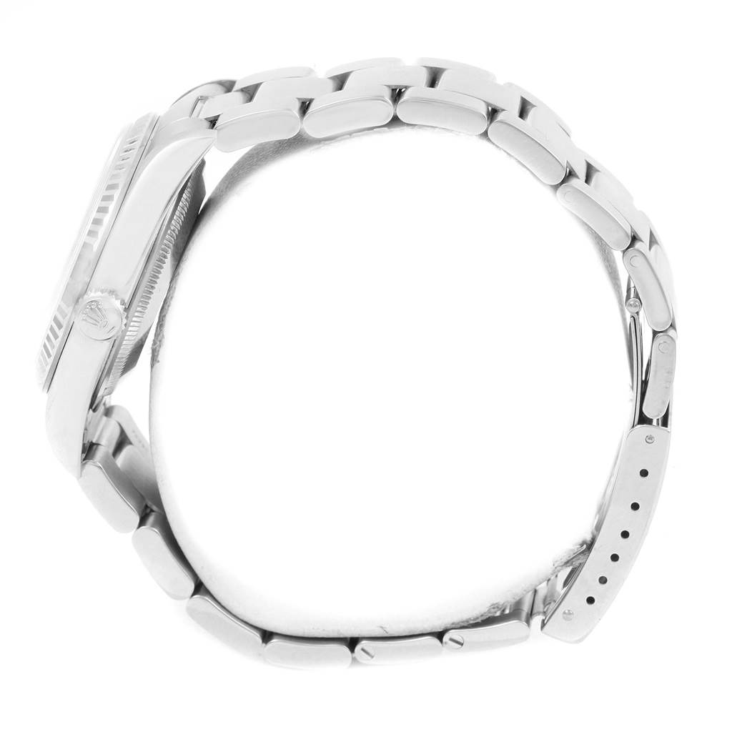 The image shows a side view of the Rolex Datejust 16234 Men's Stainless Steel Silver Dial 16234 Men's Stainless Steel Silver Dial watch, focusing on the case, crown, and bracelet.