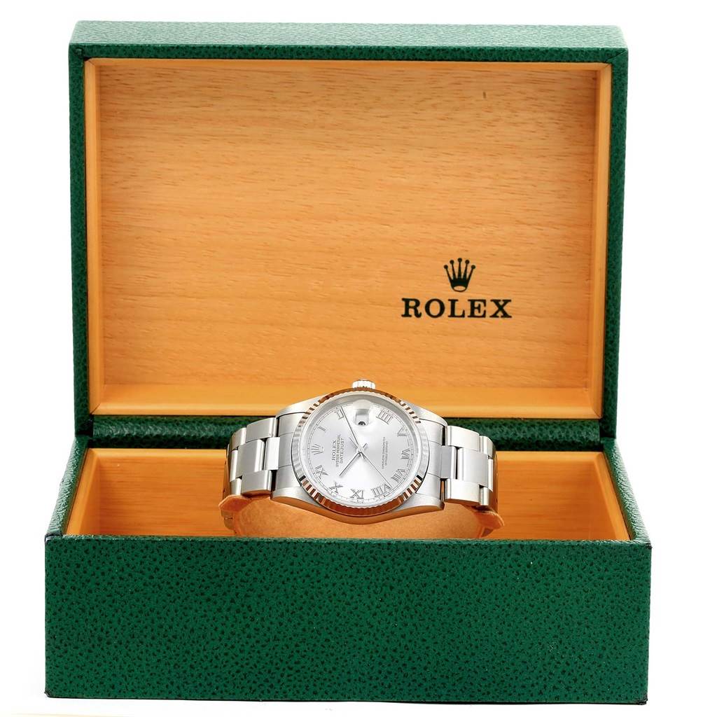 The Rolex Datejust 16234 Men's Stainless Steel Silver Dial 16234 Men's Stainless Steel Silver Dial watch is shown from a front angle, placed inside an open green box bearing the Rolex logo.