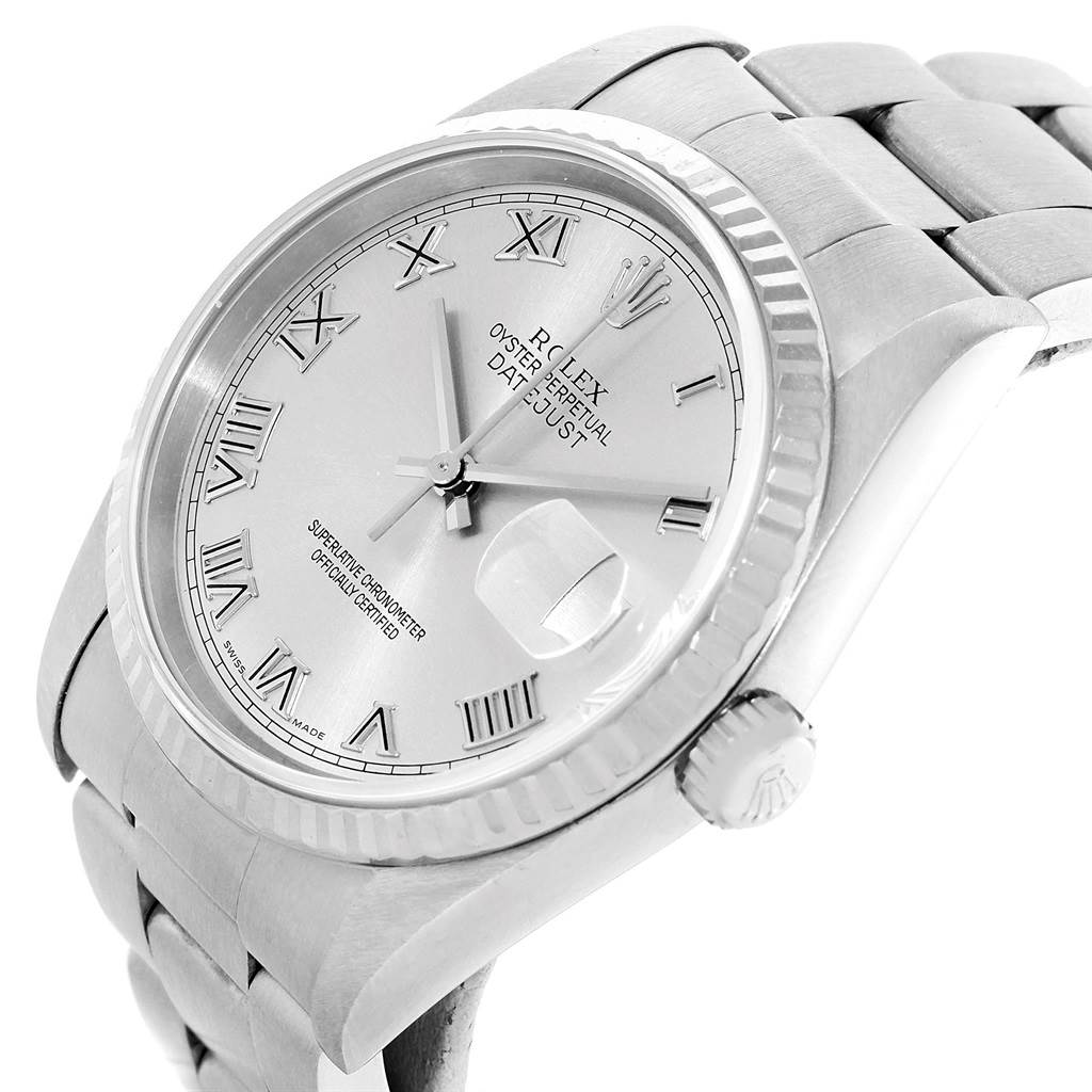 This image shows a Rolex Datejust 16234 Men's Stainless Steel Silver Dial 16234 Men's Stainless Steel Silver Dial watch taken from a slight side angle, showcasing the dial, bezel, and part of the bracelet.