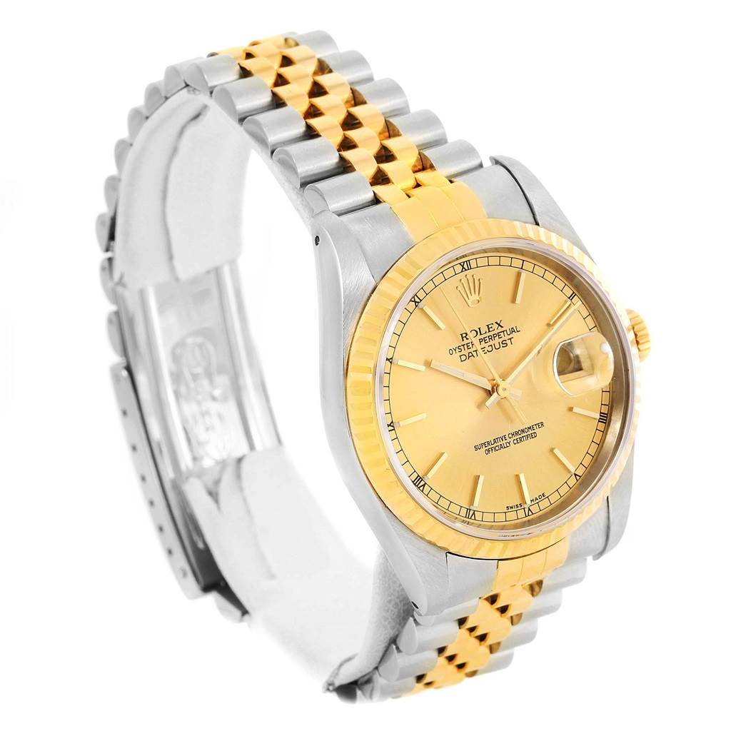 This image shows the Rolex Datejust 16233 Men's Steel and Gold (two tone) Champagne Dial 16233 Men's Steel and Gold (two tone) Champagne Dial watch at an angle highlighting its face, bezel, and two-tone bracelet.