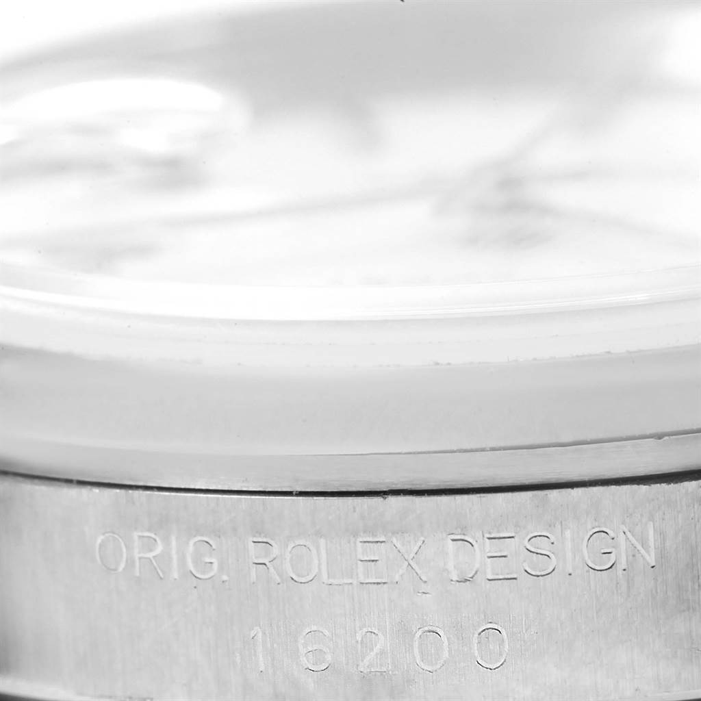 The image shows a close-up of the casing and serial number of a Rolex Datejust 16200 Men
s Stainless Steel White Dial 16200 Men
s Stainless Steel White Dial model watch.