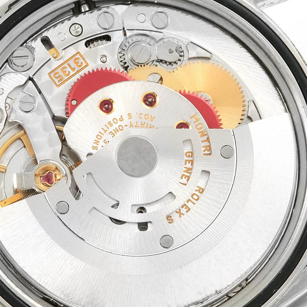 The image shows the movement and internal mechanics of a Rolex Datejust 16200 Men's Stainless Steel Blue Dial 16200 Men's Stainless Steel Blue Dial watch from a close-up, angled view.