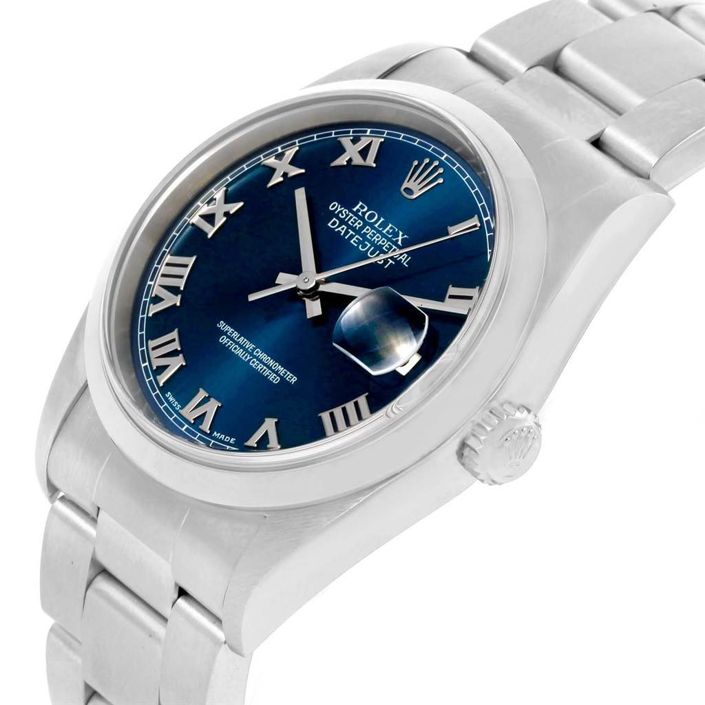 This image shows a close-up, angled view of the Rolex Datejust 16200 Men's Stainless Steel Blue Dial 16200 Men's Stainless Steel Blue Dial watch, focusing on its blue dial, Roman numerals, and metal bracelet.