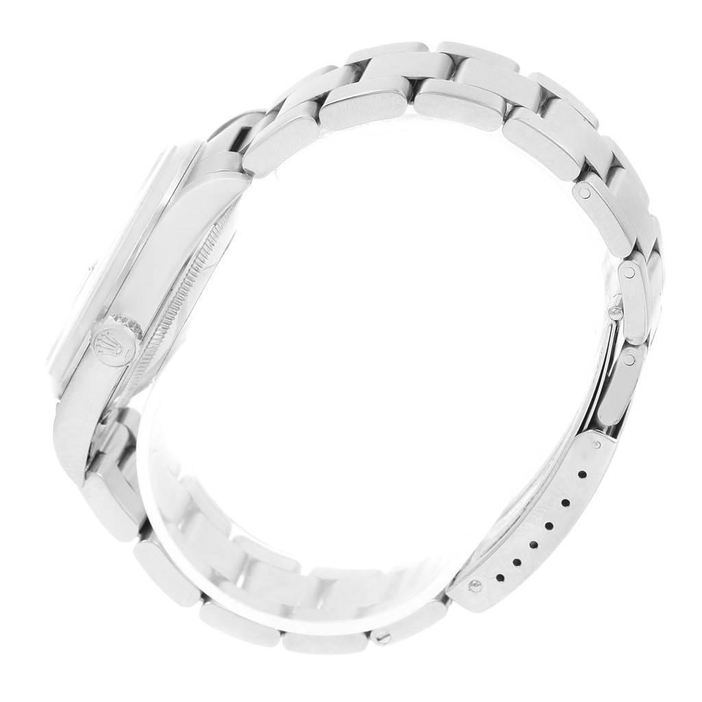 The image shows a side view of the Rolex Datejust 16200 Men's Stainless Steel Blue Dial 16200 Men's Stainless Steel Blue Dial watch, highlighting the case, crown, and bracelet.