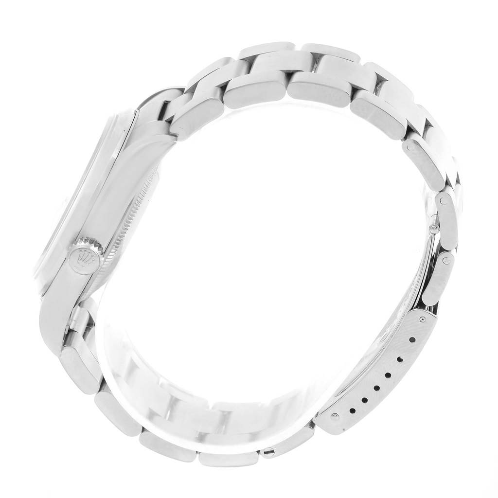 The image shows a side view of the Rolex Datejust 16200 Men's Stainless Steel Silver Dial 16200 Men's Stainless Steel Silver Dial watch, highlighting the case, crown, and bracelet clasp.