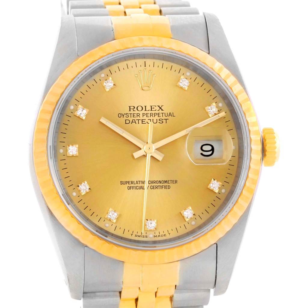 The image shows a front view of a Rolex Datejust 16233 Men's Steel and Gold (two tone) Champagne Dial 16233 Men's Steel and Gold (two tone) Champagne Dial watch, highlighting its gold dial, date window, and two-tone bracelet.