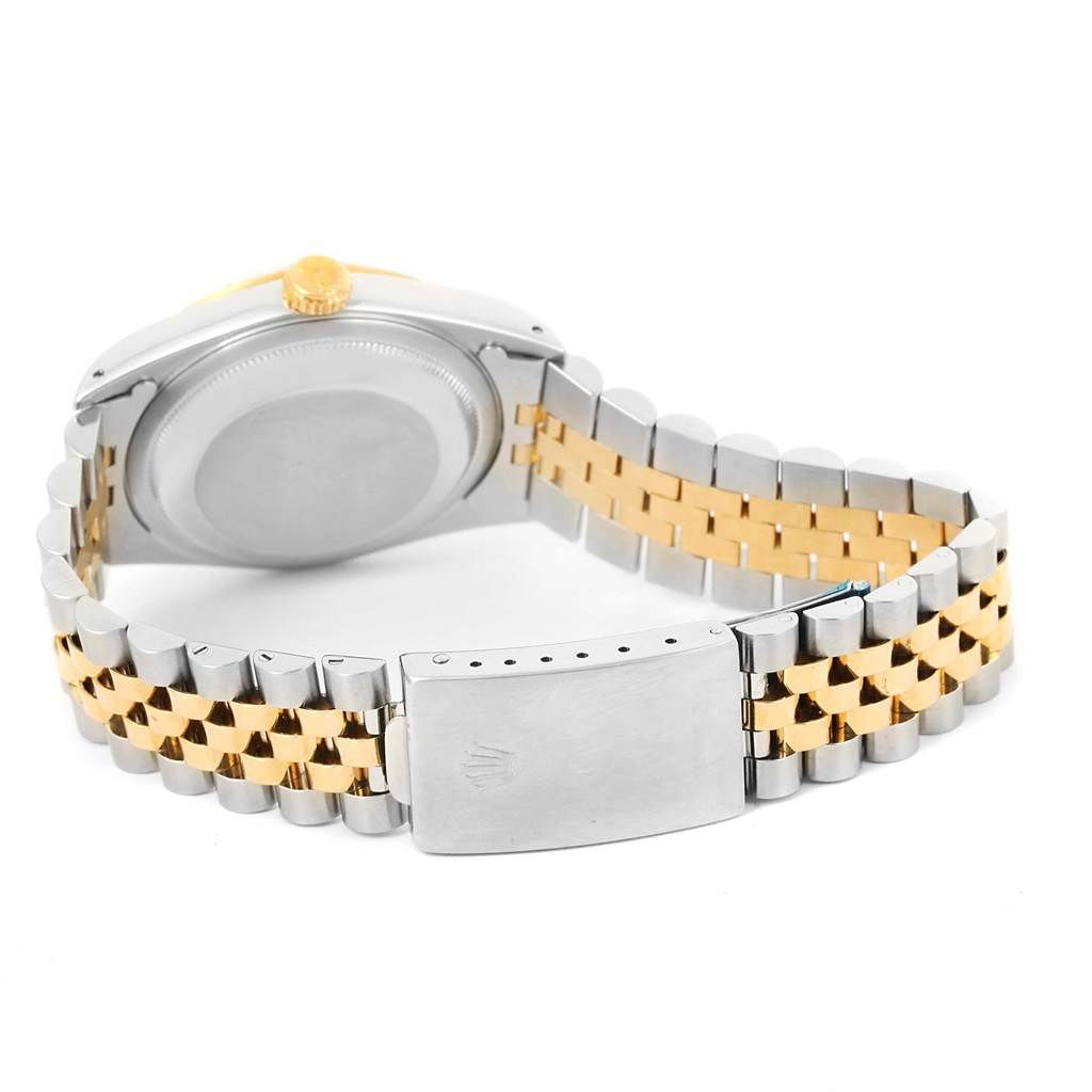 The image shows the back of a Rolex Datejust 16233 Men's Steel and Gold (two tone) Champagne Dial 16233 Men's Steel and Gold (two tone) Champagne Dial watch, highlighting its two-tone Jubilee bracelet and clasp.