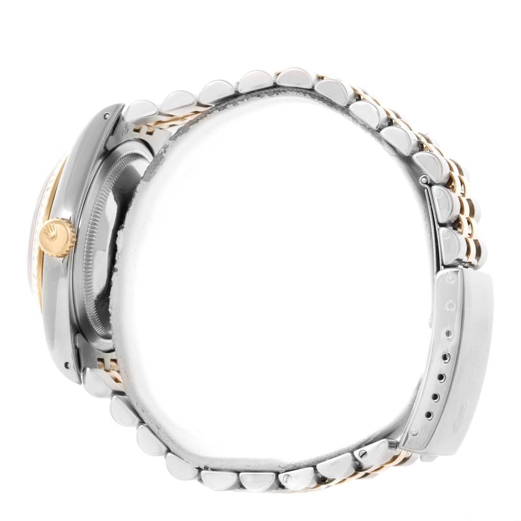 The image shows a side view of a Rolex Datejust 16233 Men's Steel and Gold (two tone) Black Dial 16233 Men's Steel and Gold (two tone) Black Dial watch, focusing on the crown, case, and a portion of the bracelet.