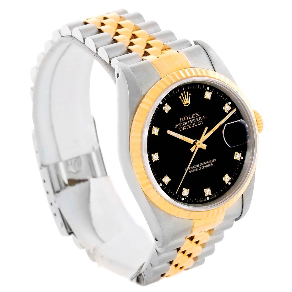 This image shows a side angle of the Rolex Datejust 16233 Men's Steel and Gold (two tone) Black Dial 16233 Men's Steel and Gold (two tone) Black Dial, highlighting the black dial, fluted bezel, and two-tone bracelet.