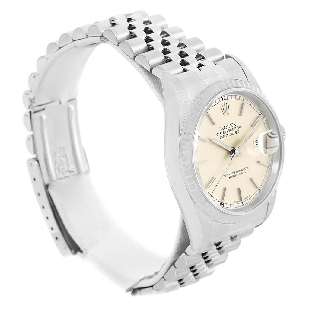 This image shows a Rolex Datejust 16220 Men's Stainless Steel Silver Dial 16220 Men's Stainless Steel Silver Dial watch from a side angle, highlighting the face, bezel, and bracelet.