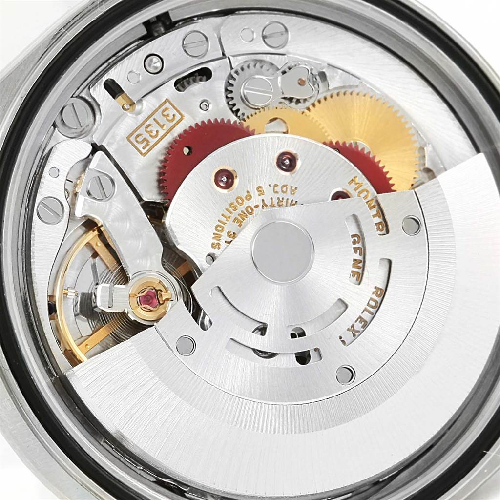Close-up view of the Rolex Datejust 16220 Men's Stainless Steel Silver Dial 16220 Men's Stainless Steel Silver Dial watch movement, showing intricate gears and components.