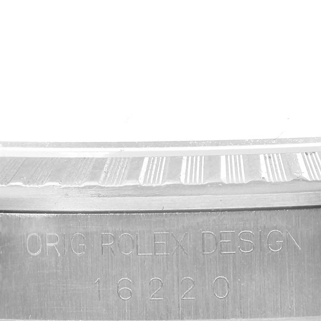 This image shows a close-up of the bezel and case side of a Rolex Datejust 16220 Men's Stainless Steel Silver Dial 16220 Men's Stainless Steel Silver Dial model, displaying the engraved "Orig Rolex Design 16220."