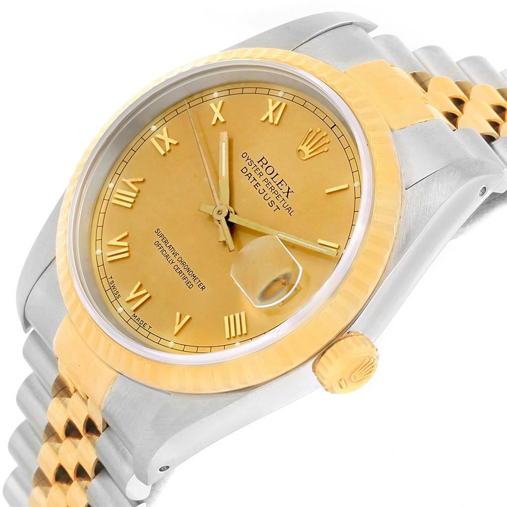 The image shows a partial side angle of a Rolex Datejust 16233 Men's Steel and Gold (two tone) Champagne Dial 16233 Men's Steel and Gold (two tone) Champagne Dial watch, highlighting its dial, fluted bezel, and Jubilee bracelet.