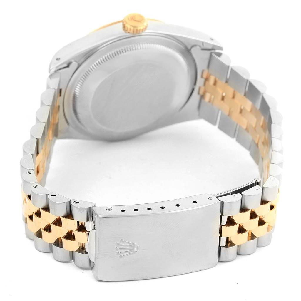 The image shows the back and clasp of a two-tone Rolex Datejust 16233 Men's Steel and Gold (two tone) Champagne Dial 16233 Men's Steel and Gold (two tone) Champagne Dial watch at an angle.