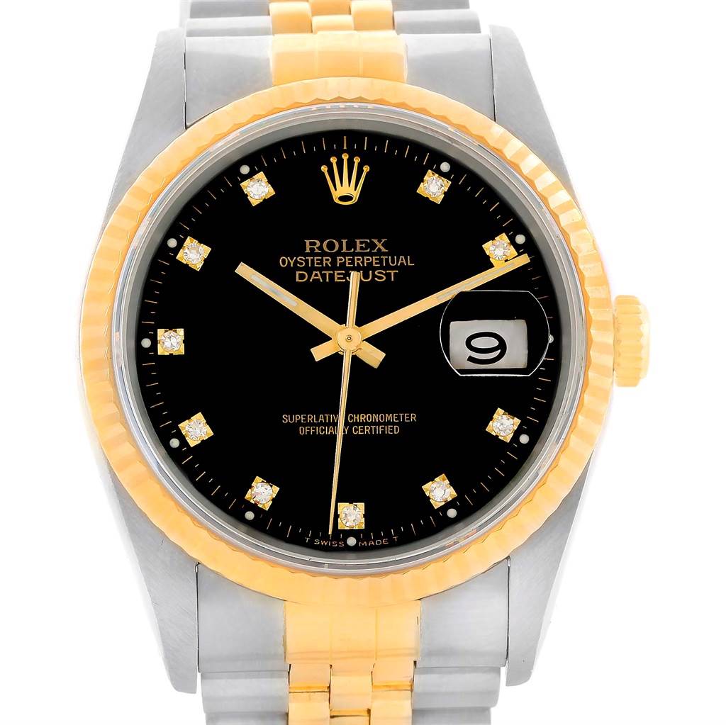 This image shows a Rolex Datejust 16233 Steel and Gold (two tone) Black Dial 16233 Steel and Gold (two tone) Black Dial watch, featuring a gold and silver bracelet, black dial with date window, and diamond hour markers.