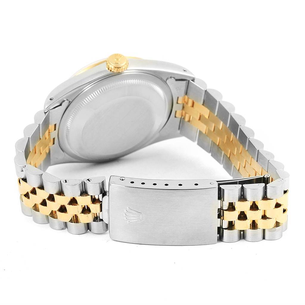 The image shows the back view of the Rolex Datejust 16233 Steel and Gold (two tone) Black Dial 16233 Steel and Gold (two tone) Black Dial watch, highlighting its Jubilee bracelet and clasp.