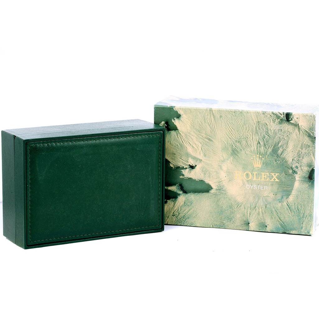 The image shows the packaging of a Rolex Datejust 16233 Men's Steel and Gold (two tone) Champagne Dial 16233 Men's Steel and Gold (two tone) Champagne Dial, including a green box and an outer sleeve with a textured design.