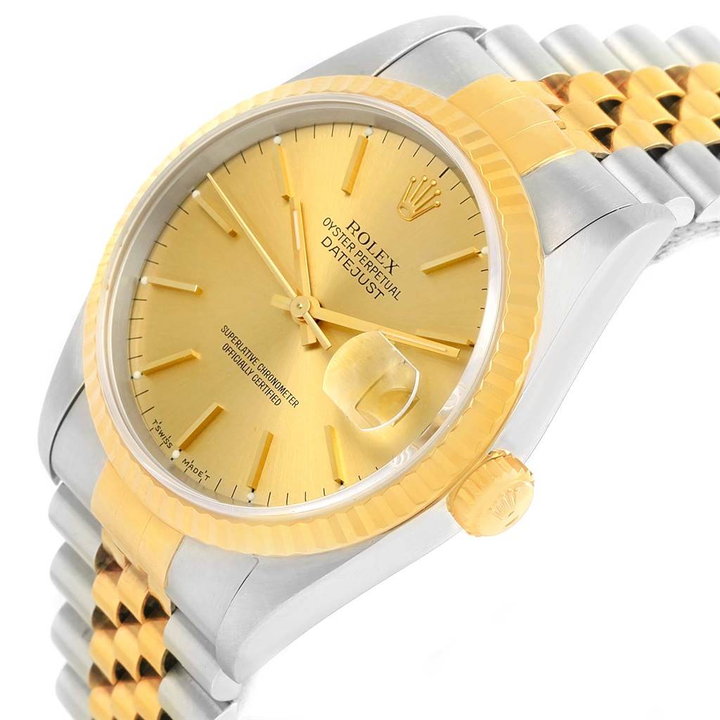 The image shows a Rolex Datejust 16233 Men's Steel and Gold (two tone) Champagne Dial 16233 Men's Steel and Gold (two tone) Champagne Dial watch from a diagonal side angle, highlighting the gold bezel, dial, and two-tone bracelet.