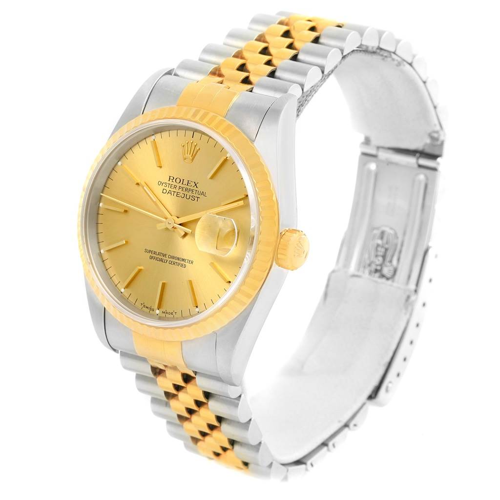 The Rolex Datejust 16233 Men's Steel and Gold (two tone) Champagne Dial 16233 Men's Steel and Gold (two tone) Champagne Dial watch is shown at an angle displaying its face, bezel, crown, and part of the Jubilee bracelet.