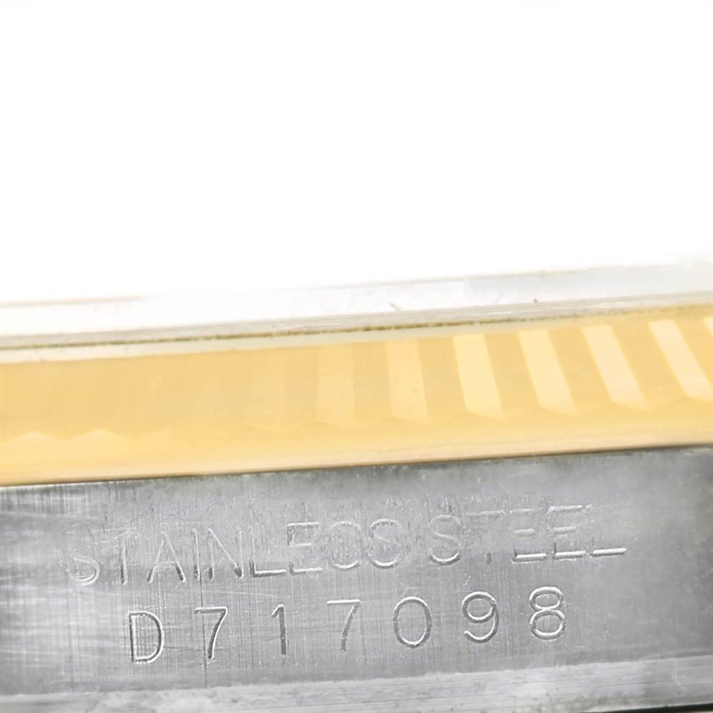 The image shows a close-up of the case number and the fluted bezel of a Rolex Datejust 116233 Men's Stainless Steel Grey Dial 116233 Men's Stainless Steel Grey Dial watch.