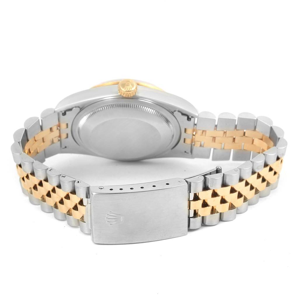 The image shows the back view of a Rolex Datejust 16233 Men's Steel and Gold (two tone) Beige Dial 16233 Men's Steel and Gold (two tone) Beige Dial watch, highlighting the case back and the two-tone jubilee bracelet with the clasp.