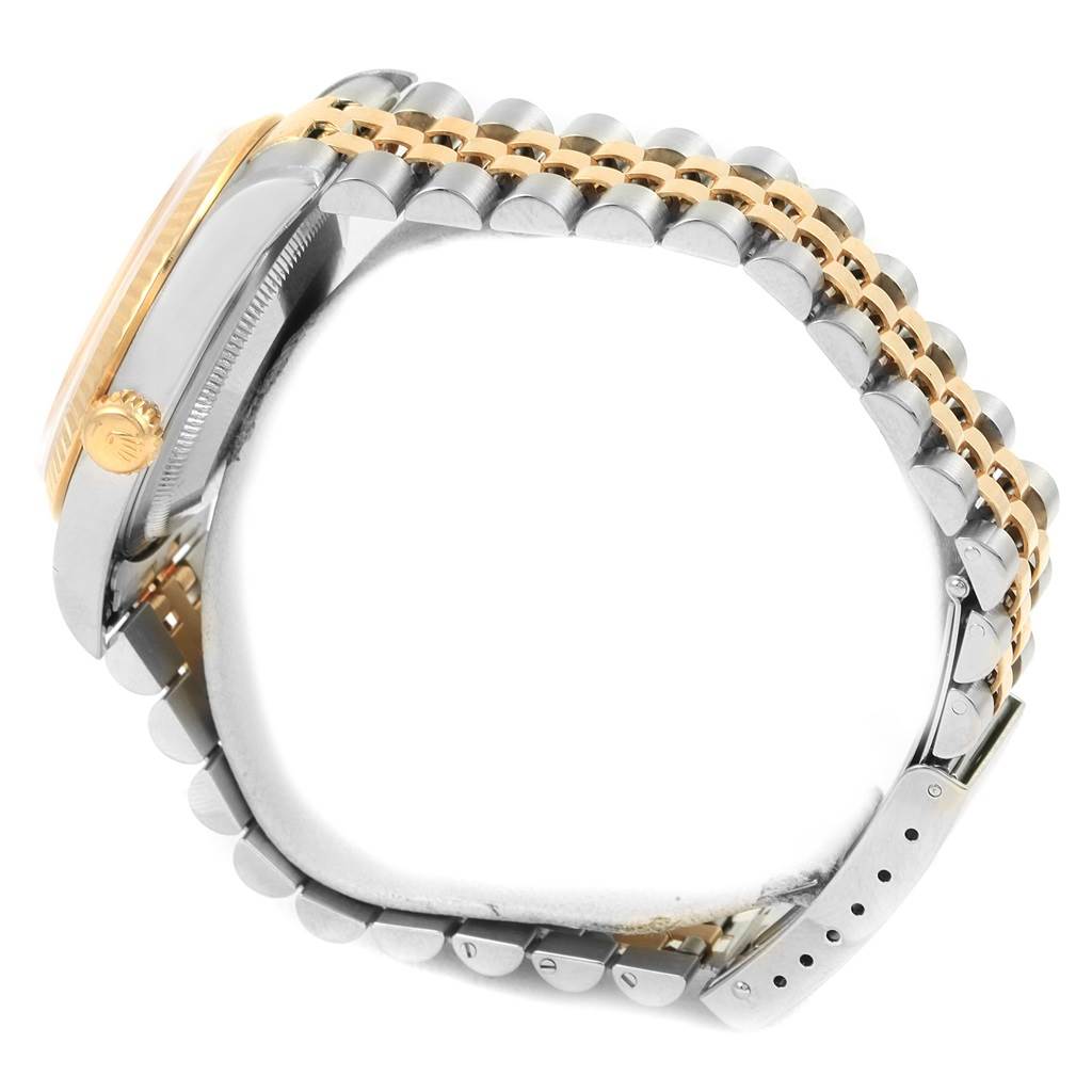 The image shows a side view of a Rolex Datejust 16233 Men's Steel and Gold (two tone) Beige Dial 16233 Men's Steel and Gold (two tone) Beige Dial watch, highlighting the crown, case, and the two-tone bracelet.