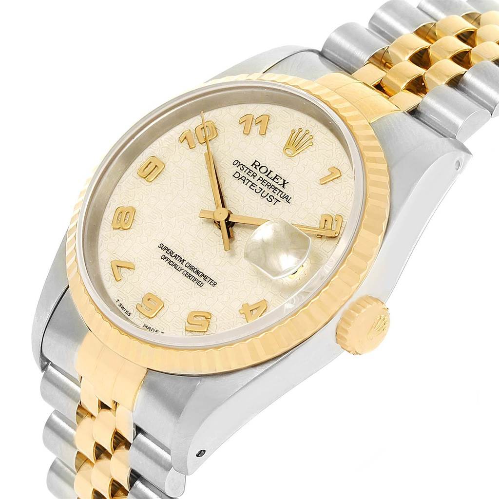 This image shows a side angle of a Rolex Datejust 16233 Men's Steel and Gold (two tone) Beige Dial 16233 Men's Steel and Gold (two tone) Beige Dial watch highlighting the face, bezel, and bracelet.
