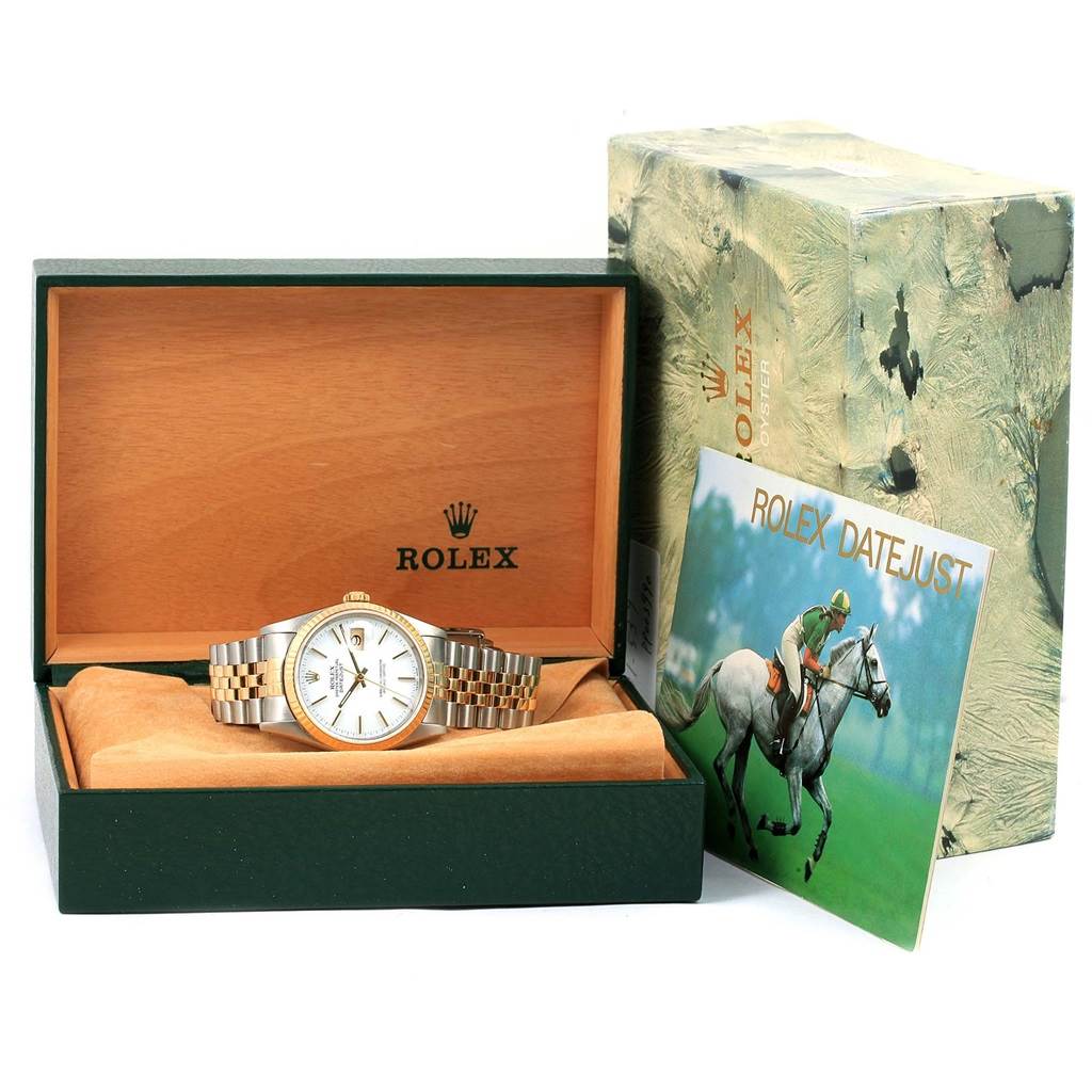 The Rolex Datejust 16233 Men's Steel and Gold (two tone) White Dial 16233 Men's Steel and Gold (two tone) White Dial watch is shown front-facing, displayed in its open box, with its packaging and booklet beside it.