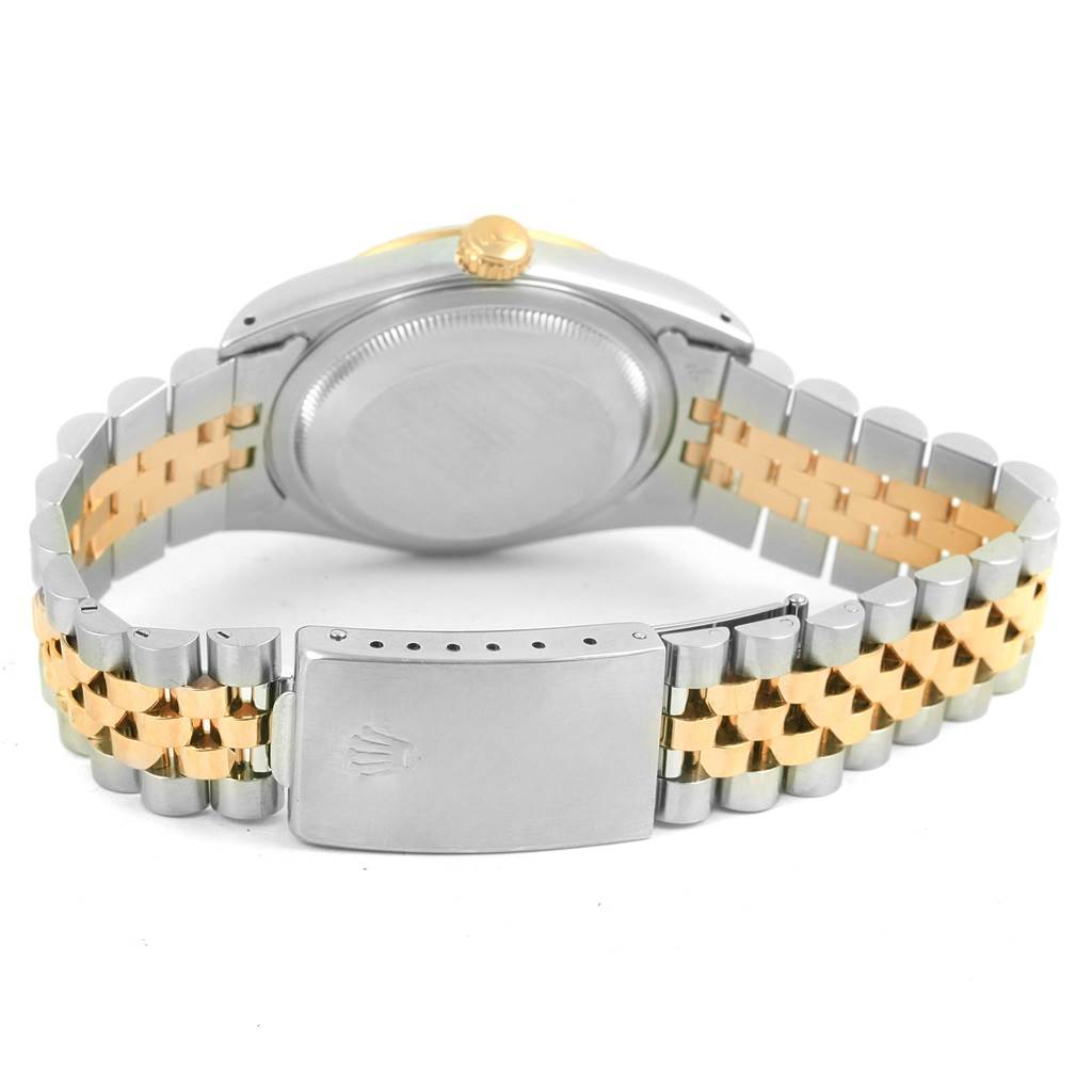 The image shows the back view of a Rolex Datejust 16233 Men's Steel and Gold (two tone) White Dial 16233 Men's Steel and Gold (two tone) White Dial watch, displaying the case back and two-tone bracelet with the clasp.