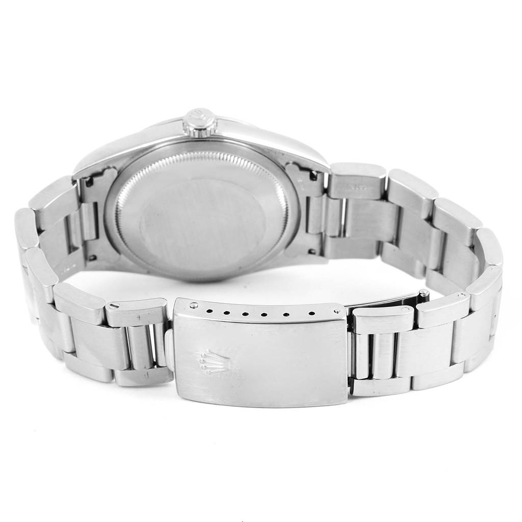 The image shows the back and clasp of a Rolex Datejust 16200 Men's Stainless Steel Grey Dial 16200 Men's Stainless Steel Grey Dial watch from an overhead angle.