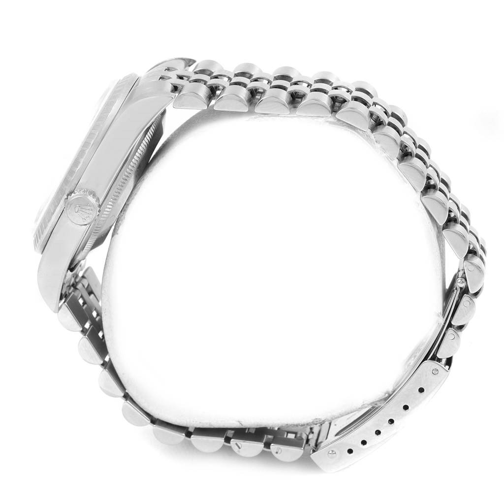 This image shows a side view of a Rolex Datejust 16220 Men's Stainless Steel White Dial 16220 Men's Stainless Steel White Dial watch, highlighting the bracelet and part of the case.