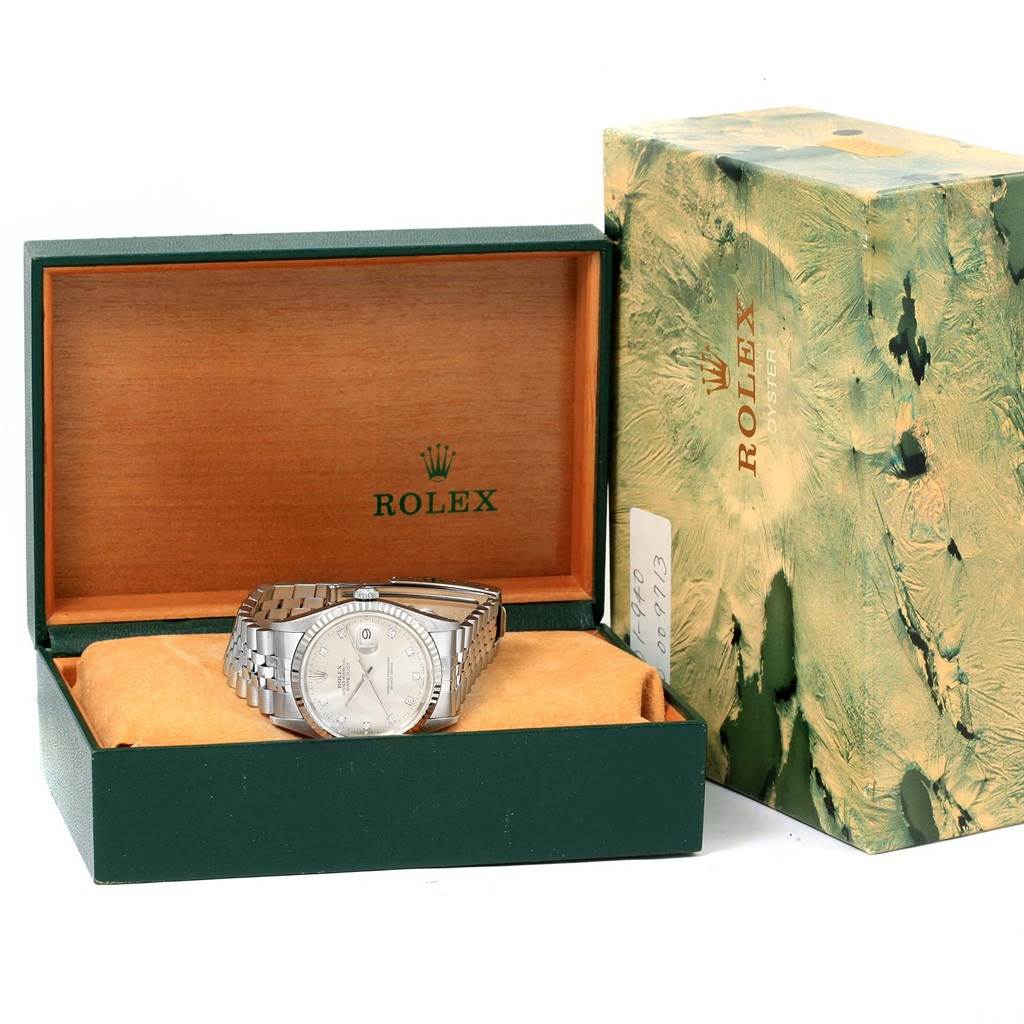 The image shows a Rolex Datejust 16234 Men's Stainless Steel Silver Dial 16234 Men's Stainless Steel Silver Dial watch in its open box, alongside the outer packaging.