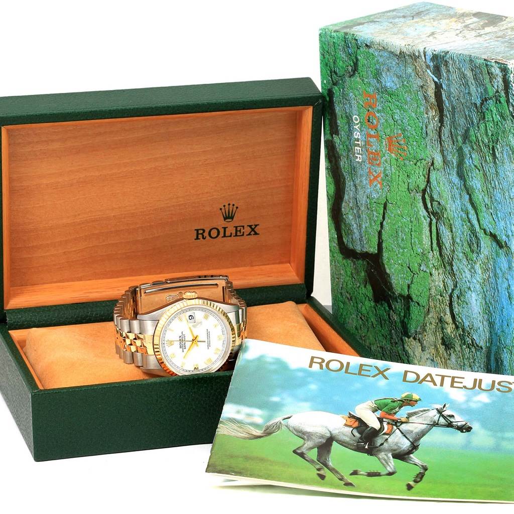 This image shows a Rolex Datejust 16233 Men's Steel and Gold (two tone) White Dial 16233 Men's Steel and Gold (two tone) White Dial watch inside its box, with the packaging and booklet visible.