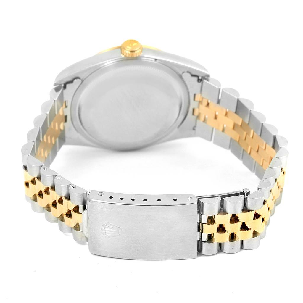 This image shows the back view of a Rolex Datejust 16233 Men's Steel and Gold (two tone) White Dial 16233 Men's Steel and Gold (two tone) White Dial watch, highlighting the case back and two-tone bracelet with the clasp.