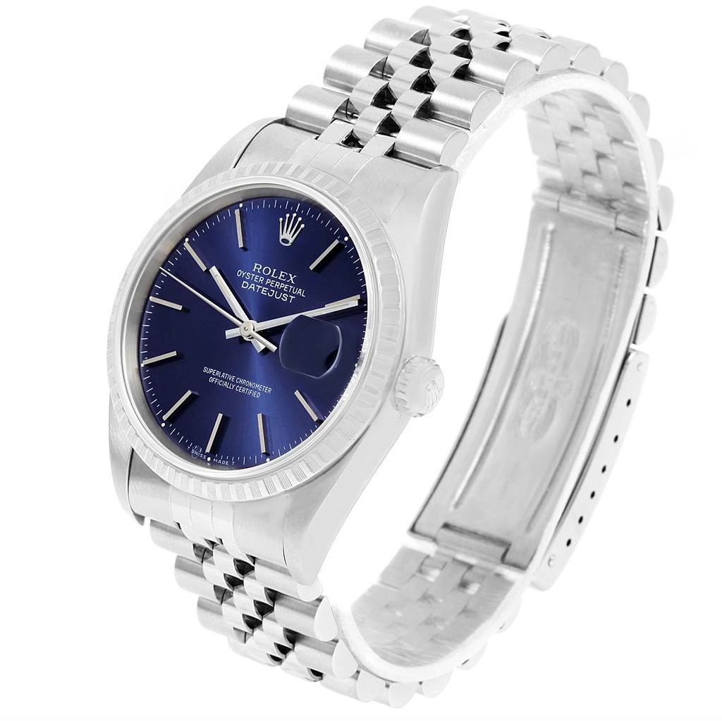 This image shows a Rolex Datejust 16220 Men's Stainless Steel Blue Dial 16220 Men's Stainless Steel Blue Dial watch at a three-quarter angle, highlighting its blue dial, fluted bezel, and Jubilee bracelet.