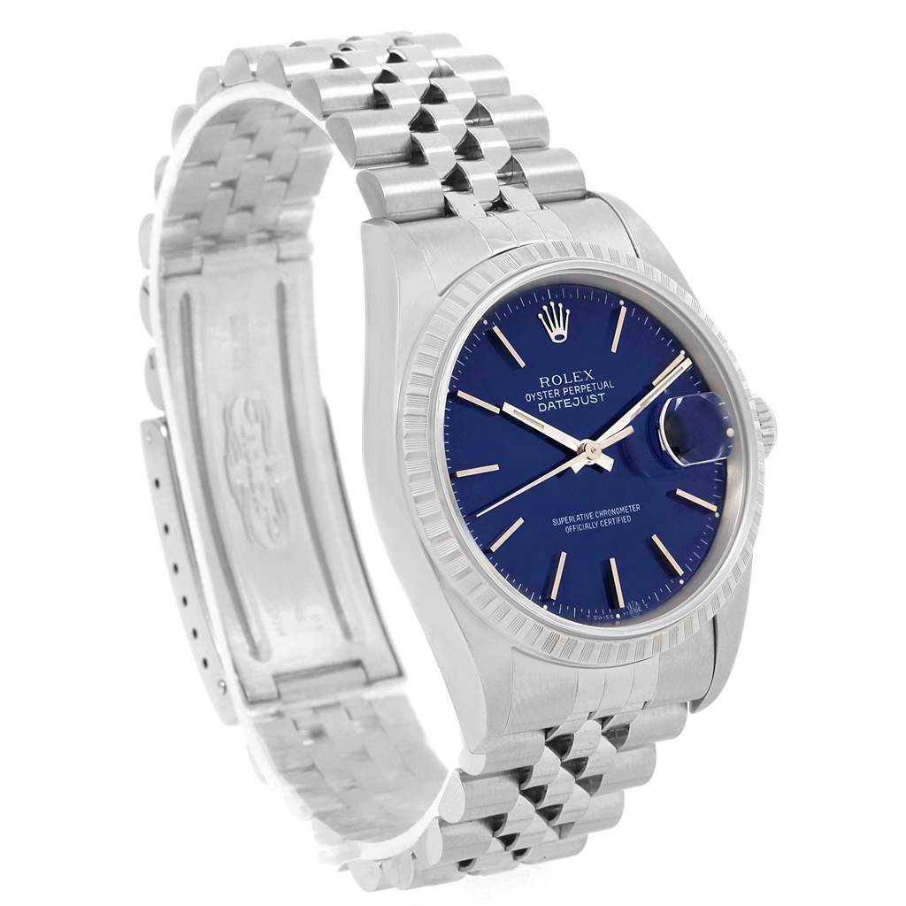 The Rolex Datejust 16220 Men's Stainless Steel Blue Dial 16220 Men's Stainless Steel Blue Dial watch shown is at a three-quarter angle, highlighting the blue dial, fluted bezel, and Jubilee bracelet.