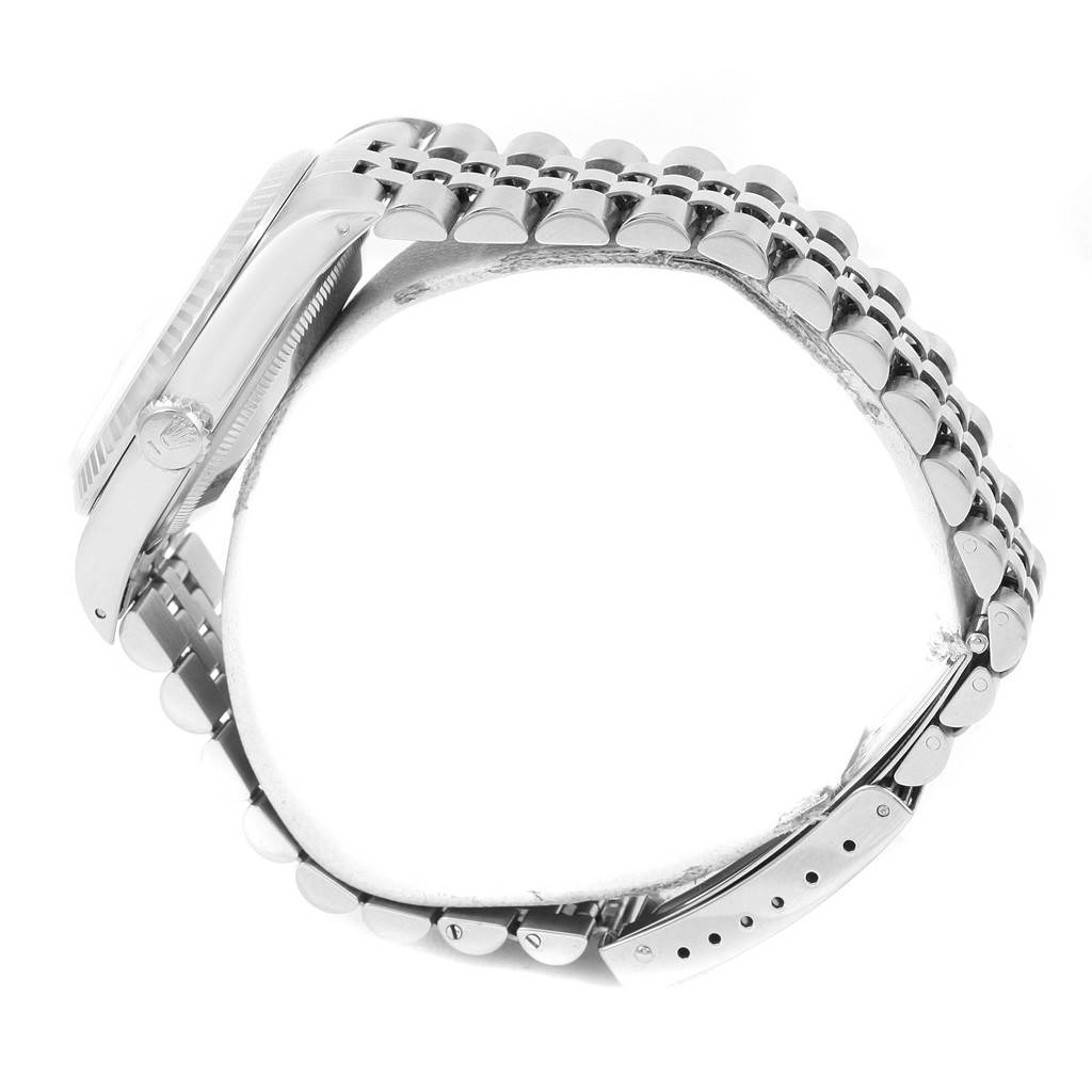 The image shows a Rolex Datejust 16234 Stainless Steel Silver Dial 16234 Stainless Steel Silver Dial watch from a side angle, highlighting the bracelet and clasp in a partially open position.