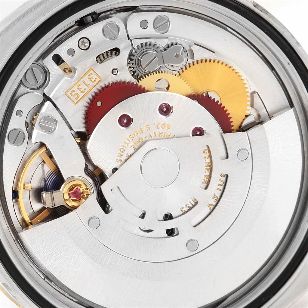 This image shows the internal mechanism and components of the Rolex Datejust 116233 Men's Stainless Steel Champagne Dial 116233 Men's Stainless Steel Champagne Dial watch from a back view.