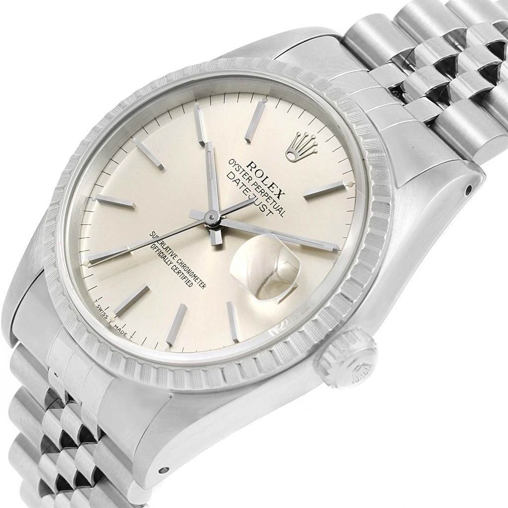 This image shows a close-up angled view of the Rolex Datejust 16220 Men
s Stainless Steel Silver Dial 16220 Men
s Stainless Steel Silver Dial watch, displaying its dial, crown, bezel, and a portion of the bracelet.