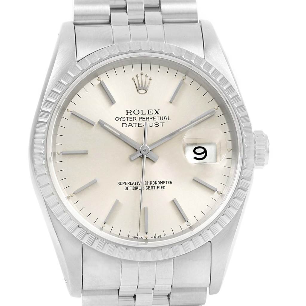 The image shows the front view of a Rolex Datejust 16220 Men
s Stainless Steel Silver Dial 16220 Men
s Stainless Steel Silver Dial watch, highlighting the dial, hands, date display, and part of the bracelet.