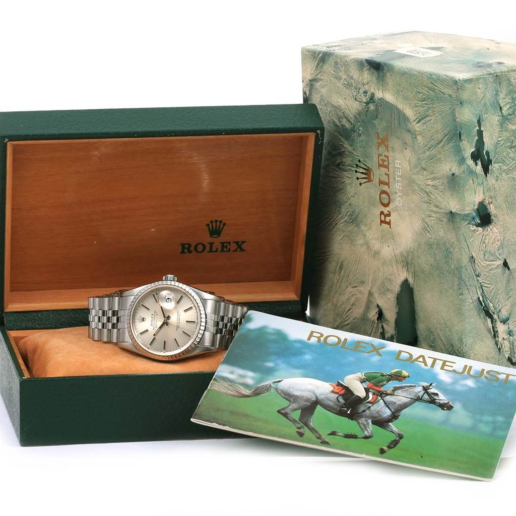 The image shows a Rolex Datejust 16220 Men
s Stainless Steel Silver Dial 16220 Men
s Stainless Steel Silver Dial watch with its original box and manual booklet, viewed from the front.