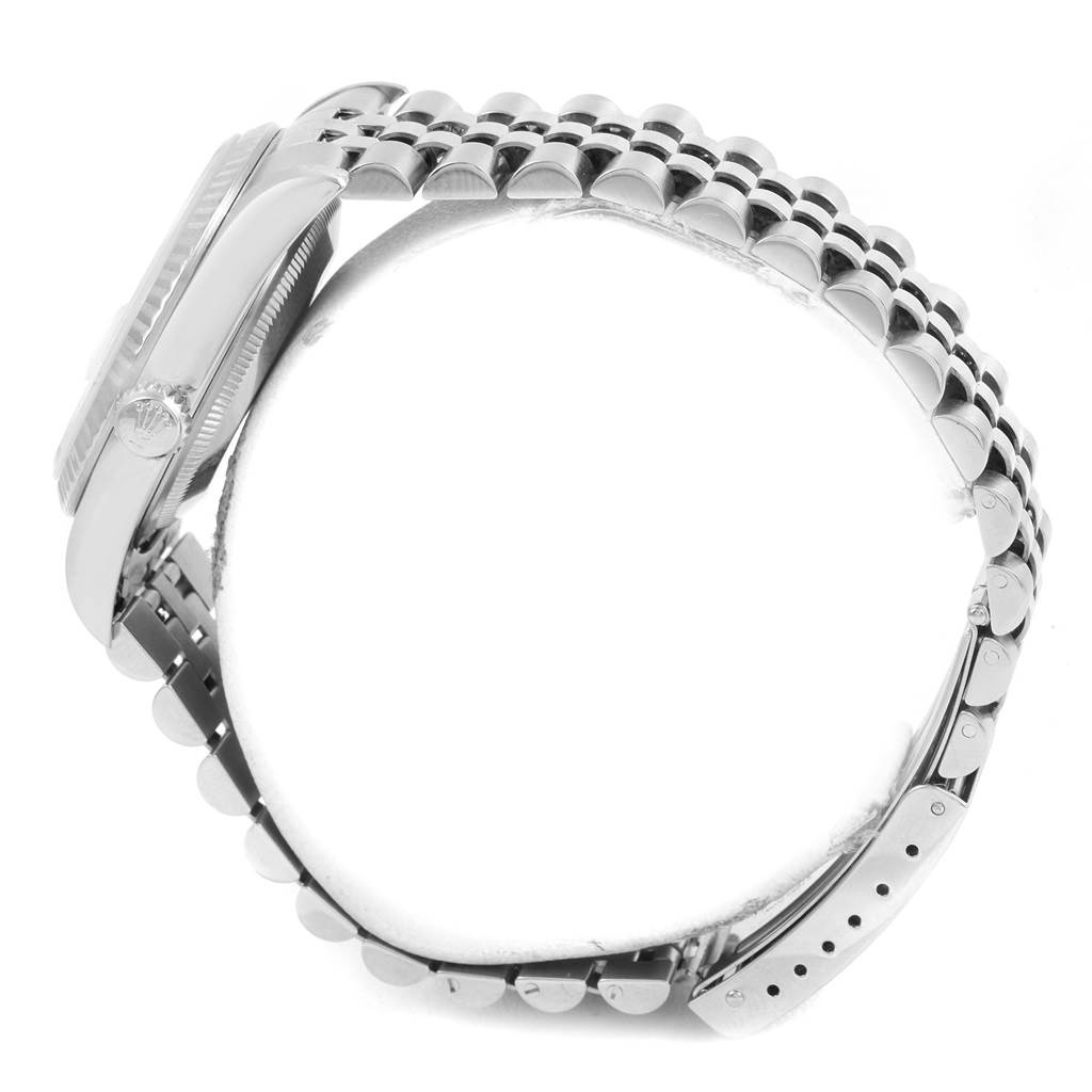 This image shows the side view of a Rolex Datejust 16234 Men's Stainless Steel Silver Dial 16234 Men's Stainless Steel Silver Dial watch, highlighting its case, crown, and bracelet.