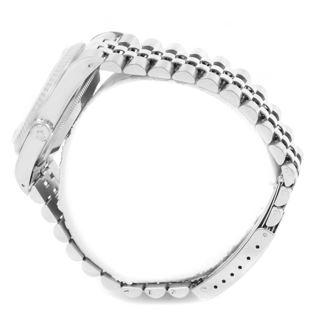 The image shows a side angle of a Rolex Datejust 16234 Men's Stainless Steel Silver Dial 16234 Men's Stainless Steel Silver Dial watch, highlighting the bracelet, case, and partially visible crown.