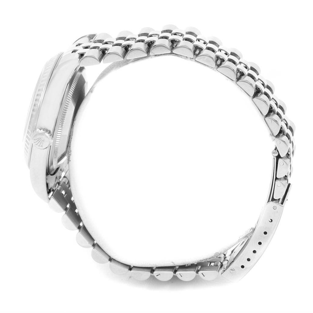 This is a side view of the Rolex Datejust 16234 Men's Stainless Steel White Dial 16234 Men's Stainless Steel White Dial watch, showing the case, crown, and bracelet.